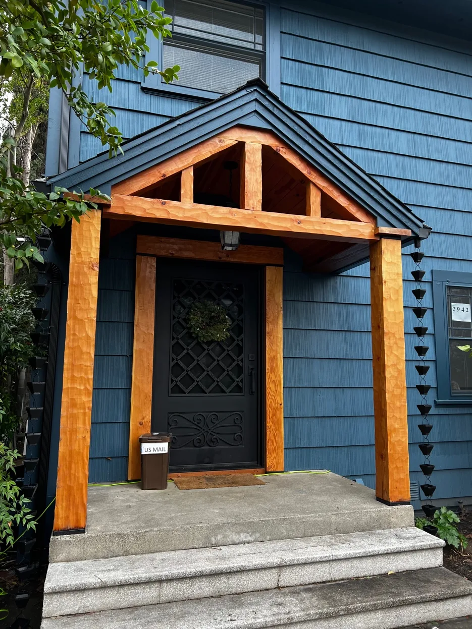 Custom hood surround and kitchen cabinetry
