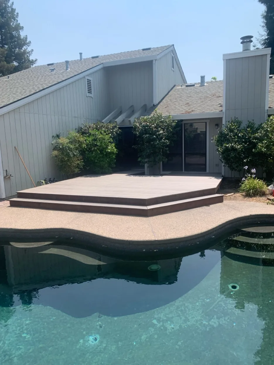 Outdoor living space with timber frame pergola
